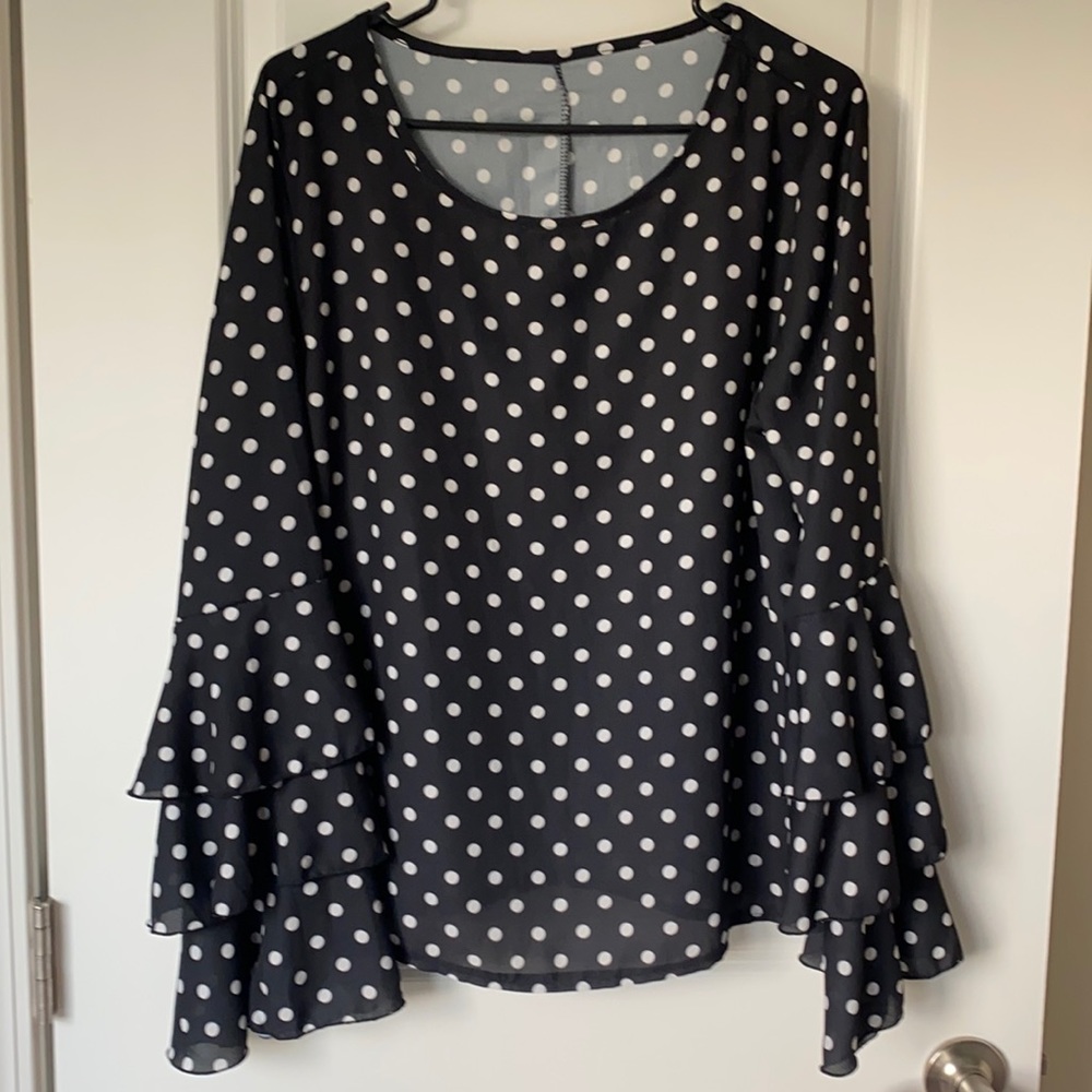 Sheer ruffled polka dot blouse